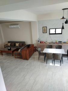 Area soggiorno di Miss Travel Homestay