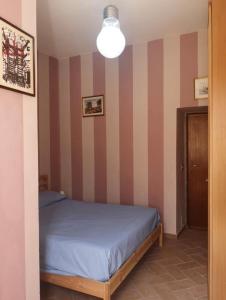 Postel nebo postele na pokoji v ubytování Giovi Guesthouse