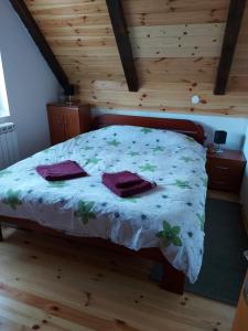 Postel nebo postele na pokoji v ubytování Apartmani Popovic Lux