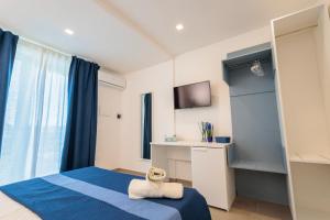Postel nebo postele na pokoji v ubytování Orizzonte Mare Panoramic Rooms