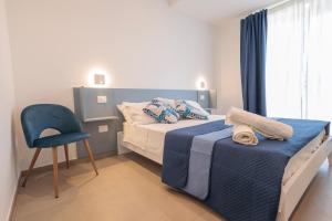 Postel nebo postele na pokoji v ubytování Orizzonte Mare Panoramic Rooms
