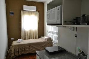 a hospital room with a bed and a window at HANKA in La Rioja