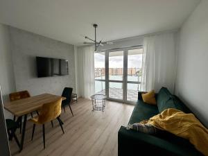 Гостиная зона в SDH 4 Radzymin comfortable apartment near Warsaw
