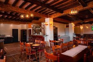 Restoran või mõni muu söögikoht majutusasutuses Pensiunea Alessia Soveja