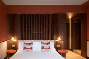 Postel nebo postele na pokoji v ubytování Amabilia Suites + 37 fotografií