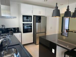 A cozinha ou cozinha compacta de Vistabela Resort & Spa