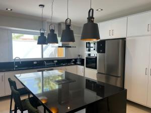 A cozinha ou cozinha compacta de Vistabela Resort & Spa