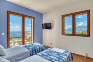 Ένα ή περισσότερα κρεβάτια σε δωμάτιο στο Vila Aria vista +190 φωτογραφίες
