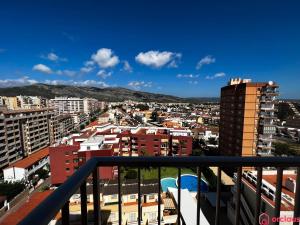 a view of a city from a balcony at Brisa Marina Mediterránea in Oropesa del Mar