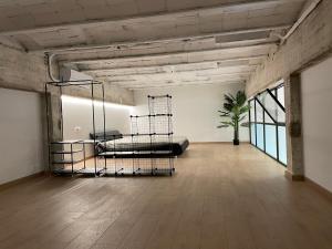 Postel nebo postele na pokoji v ubytování Manresa industrial home + 9 fotografií