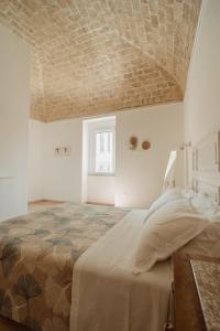 Postel nebo postele na pokoji v ubytování La Torre Vasto B&B