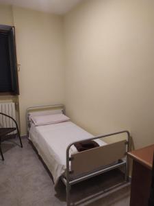 Ein Bett oder Betten in einem Zimmer der Unterkunft Appartamento Margherita