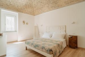 Postel nebo postele na pokoji v ubytování La Torre Vasto B&B