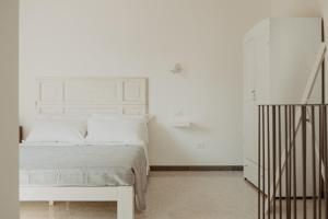 Postel nebo postele na pokoji v ubytování La Torre Vasto B&B
