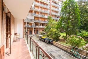 an apartment balcony with a view of a building at MM Pozzo Strada Lovely Aptartment in Turin