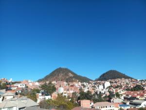 a view of a city with mountains in the background at BaspisDepar in Sucre