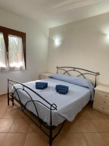Postel nebo postele na pokoji v ubytování Veliero House