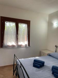 Postel nebo postele na pokoji v ubytování Veliero House