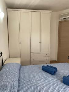 Postel nebo postele na pokoji v ubytování Veliero House