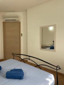 Postel nebo postele na pokoji v ubytování Veliero House