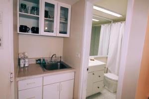 A bathroom at Castle 1733 Ocean view studio with direct beach access, pool, tennis & free parking