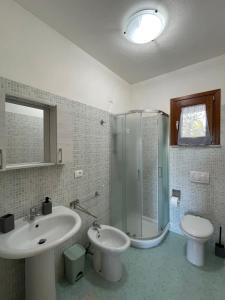 Koupelna v ubytování Veliero House + 37 fotografií