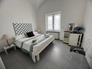 מיטה או מיטות בחדר ב-La Pica Marina Anacapri