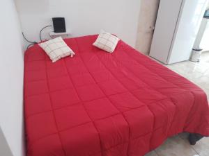 Katil atau katil-katil dalam bilik di Monoambiente céntrico