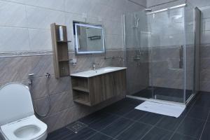 Ein Badezimmer in der Unterkunft Hotel Next