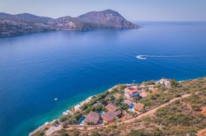 an island in the middle of a large body of water at Kalkan Likya Gardens in Kas