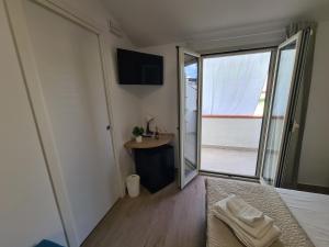 Postel nebo postele na pokoji v ubytování B&B Al Quadrato