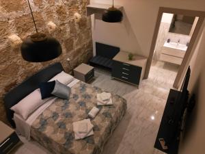 Postel nebo postele na pokoji v ubytování Lapis rooms