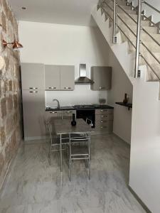 Kuchyň nebo kuchyňský kout v ubytování Lapis rooms