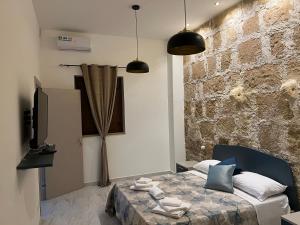 Postel nebo postele na pokoji v ubytování Lapis rooms