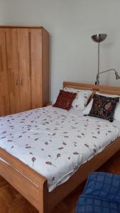 A bed or beds in a room at Obala Portoroz