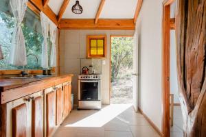 Kuhinja oz. manjša kuhinja v nastanitvi Cabaña de montaña (jacuzzi exterior)