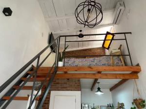 a bedroom with a bunk bed in a loft at Loft en Las Flores in Las Flores