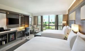Katil atau katil-katil dalam bilik di Legend Hotel Lagos Airport, Curio Collection By Hilton