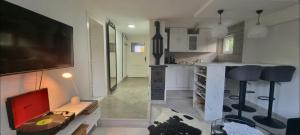 Kuchyň nebo kuchyňský kout v ubytování Garden Apartment
