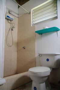 Kopalnica v nastanitvi Firefly Beach Cottages