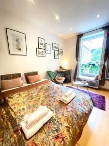 Ένα ή περισσότερα κρεβάτια σε δωμάτιο στο Studio Gallery 29