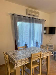 TV a/nebo společenská místnost v ubytování Veliero House