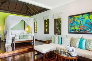 Postel nebo postele na pokoji v ubytování Hilton Seychelles Northolme Resort & Spa