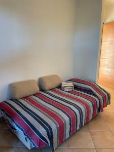 Postel nebo postele na pokoji v ubytování Veliero House