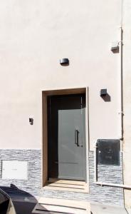 a door on the side of a building at Casa Vacanze in Salento A casa di Benedetta in Squinzano +16 photos
