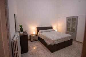 Postel nebo postele na pokoji v ubytování Casa Vacanze in Salento A casa di Benedetta