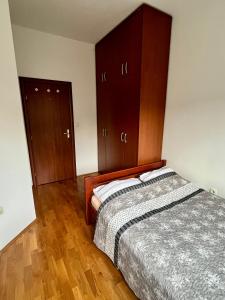 Ένα ή περισσότερα κρεβάτια σε δωμάτιο στο Lu