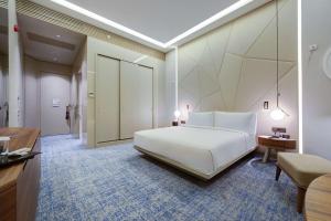 Postel nebo postele na pokoji v ubytování DoubleTree by Hilton Adana