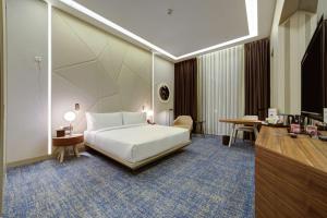 Postel nebo postele na pokoji v ubytování DoubleTree by Hilton Adana