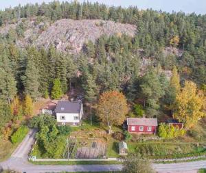 an aerial view of a house on a hill at Little Guesthouse Cabin, Once Home to Lotta Svärd in Raasepori